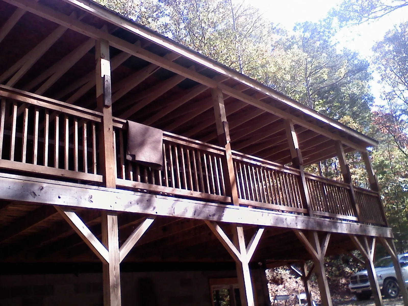 Timber framing under a new elevated porch and deck — Roof Leak Repair in Buxton by Roofing Brothers